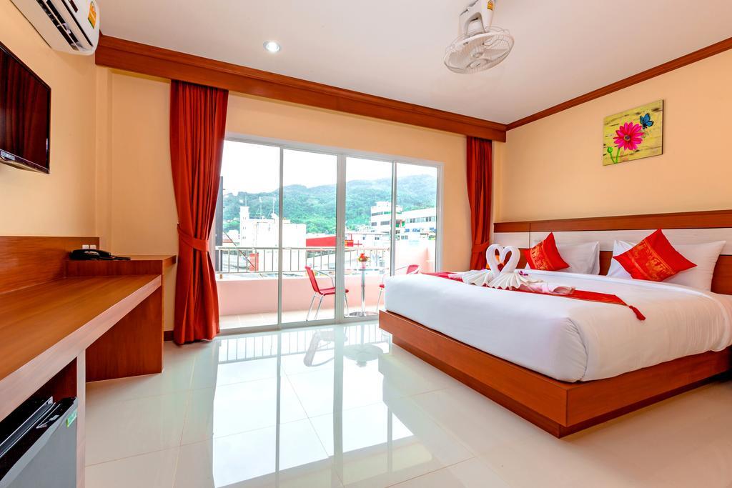 Phusita Hotel - Sha Certified Patong Bilik gambar